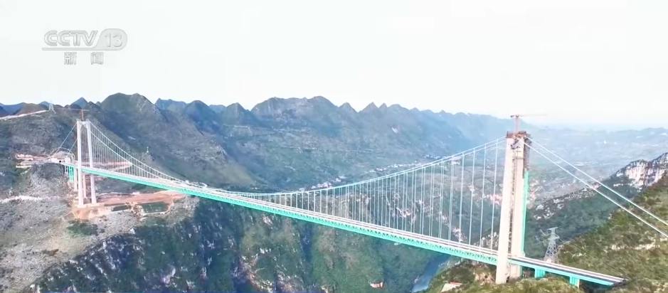 科技赋能“智”取深山峡谷 60秒回顾“世界第一高桥”建设历程